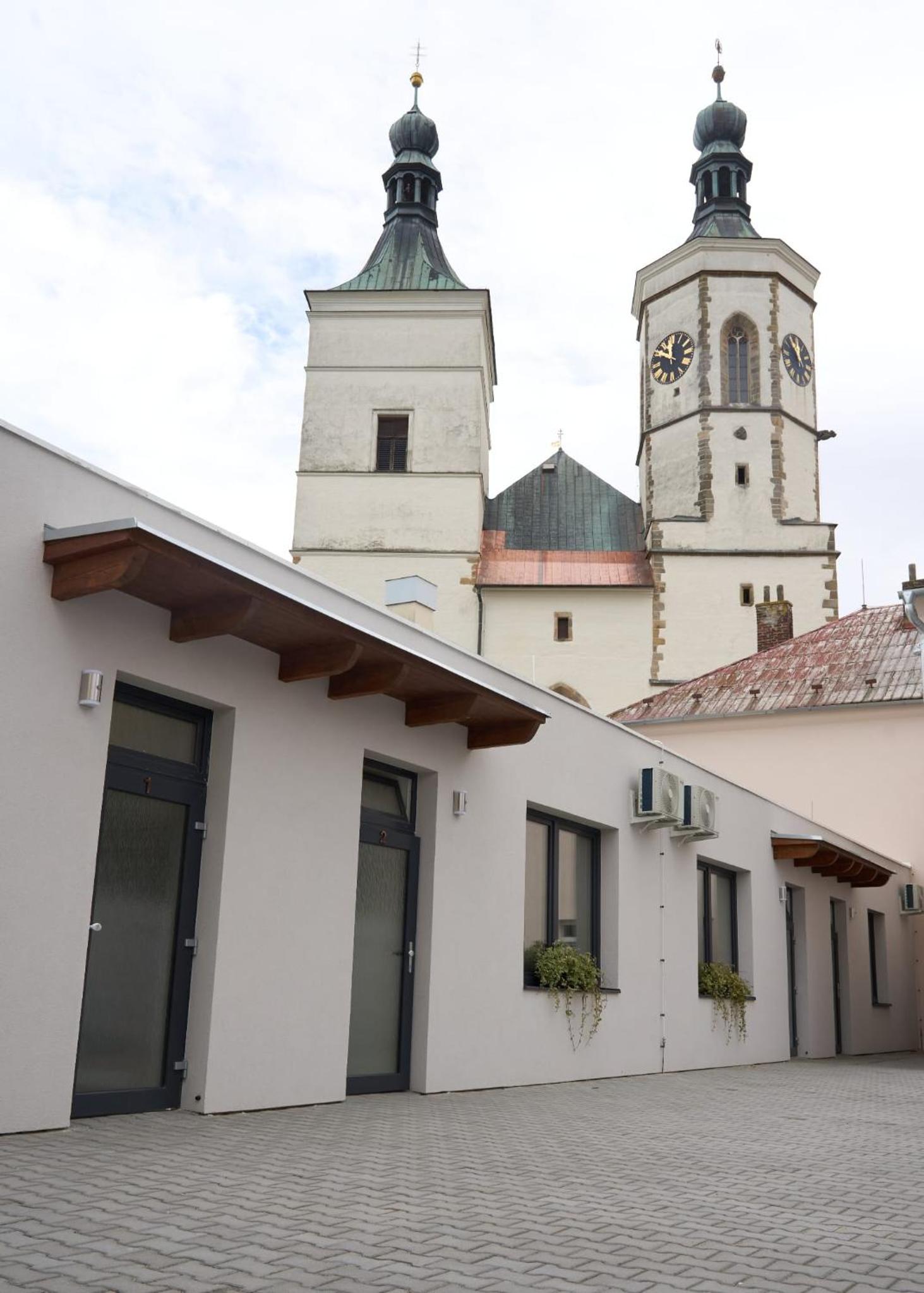 Apartmány U Kostela