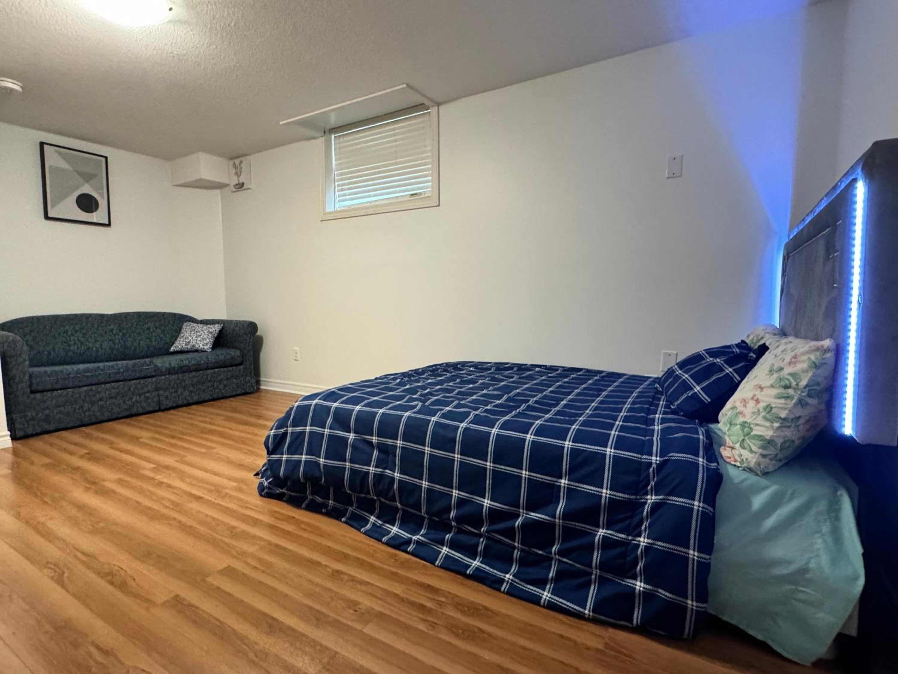 Cozy Haven 2 bedroom Basement apartment with Treated water