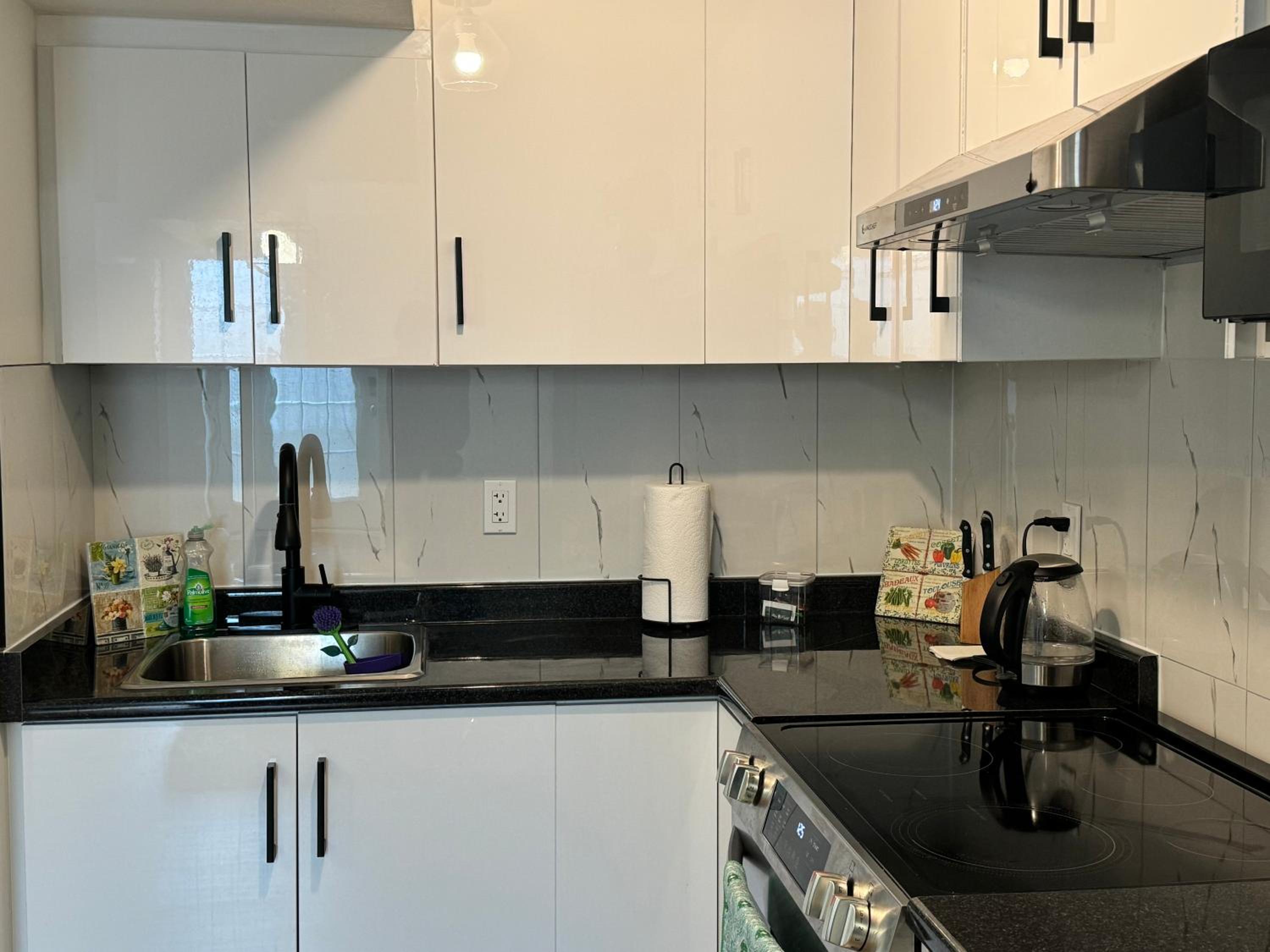 Cozy Haven 2 bedroom Basement apartment with Treated water