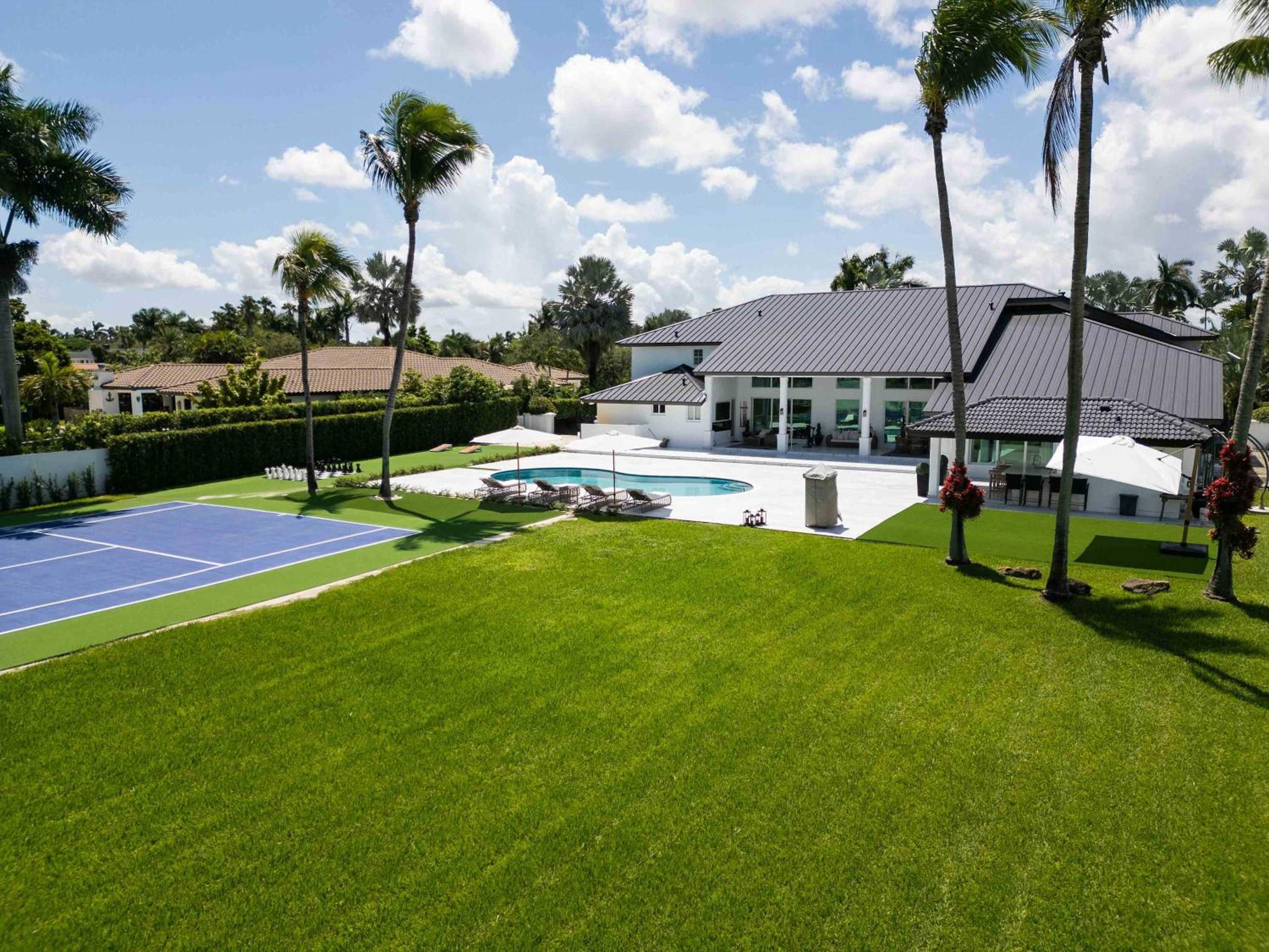 The Mansion Pool Cinema Tennis BBQ Family
