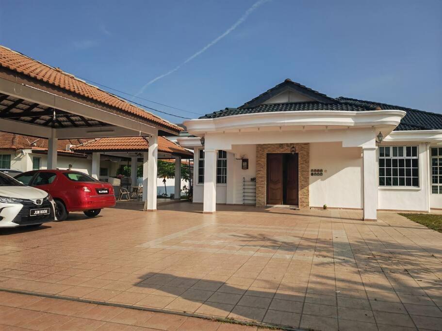 Cozy Deluxe House Padang Serai 28pax photo 6