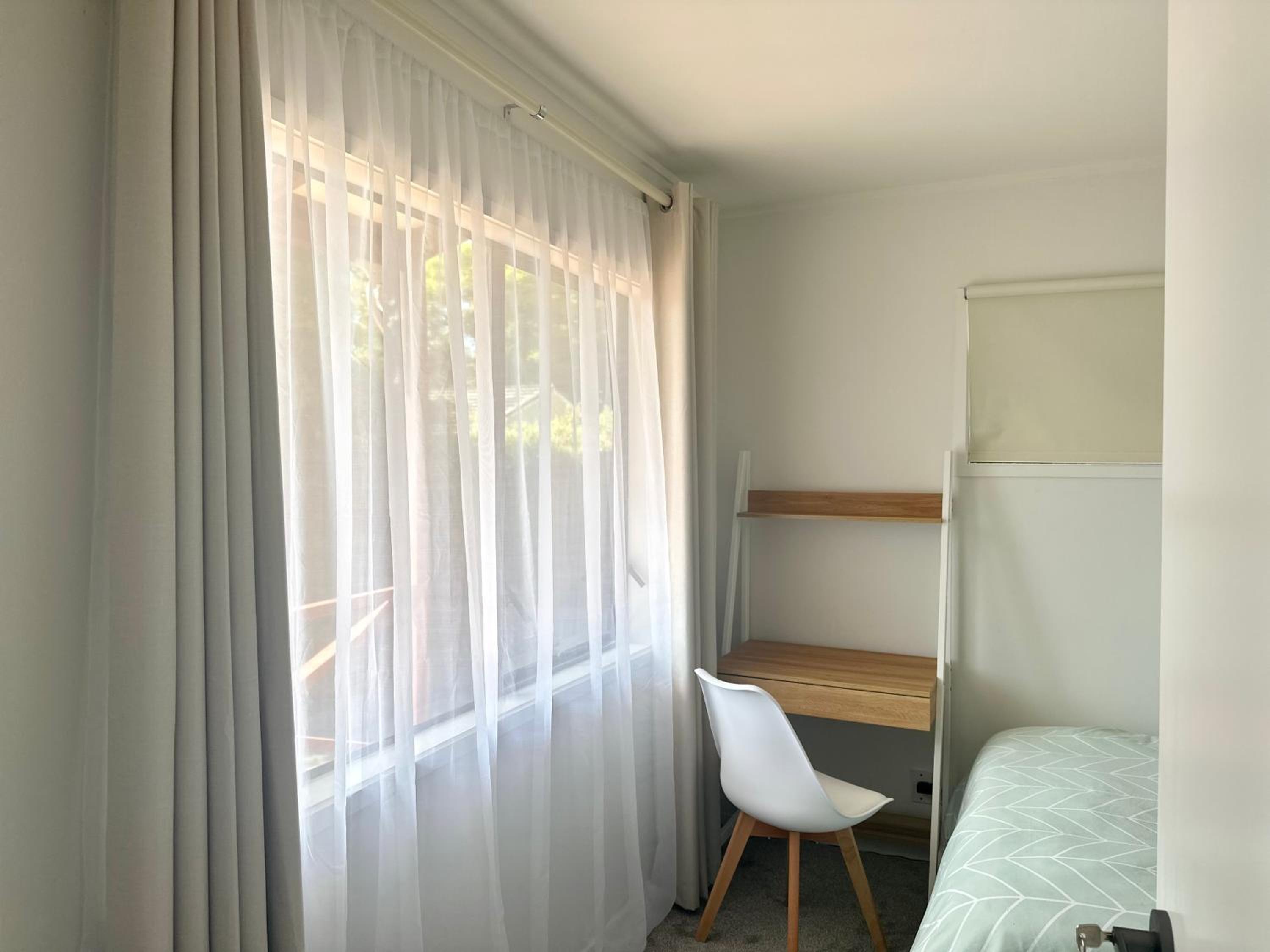 Private room with separate bathroom and carpark view 3
