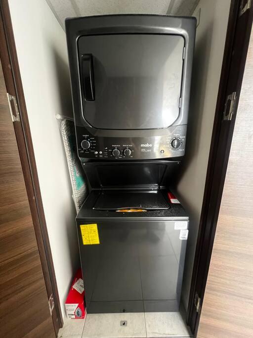 Modern & Central 2BR w Pool & Gym Prime Location view 2