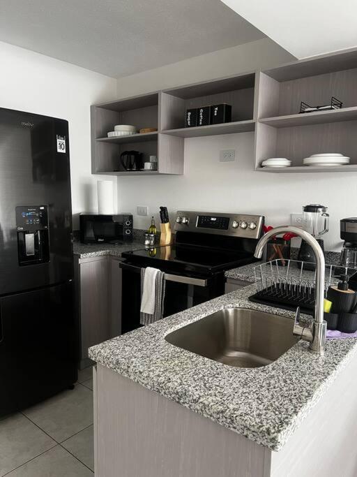 Modern & Central 2BR w Pool & Gym Prime Location view 4