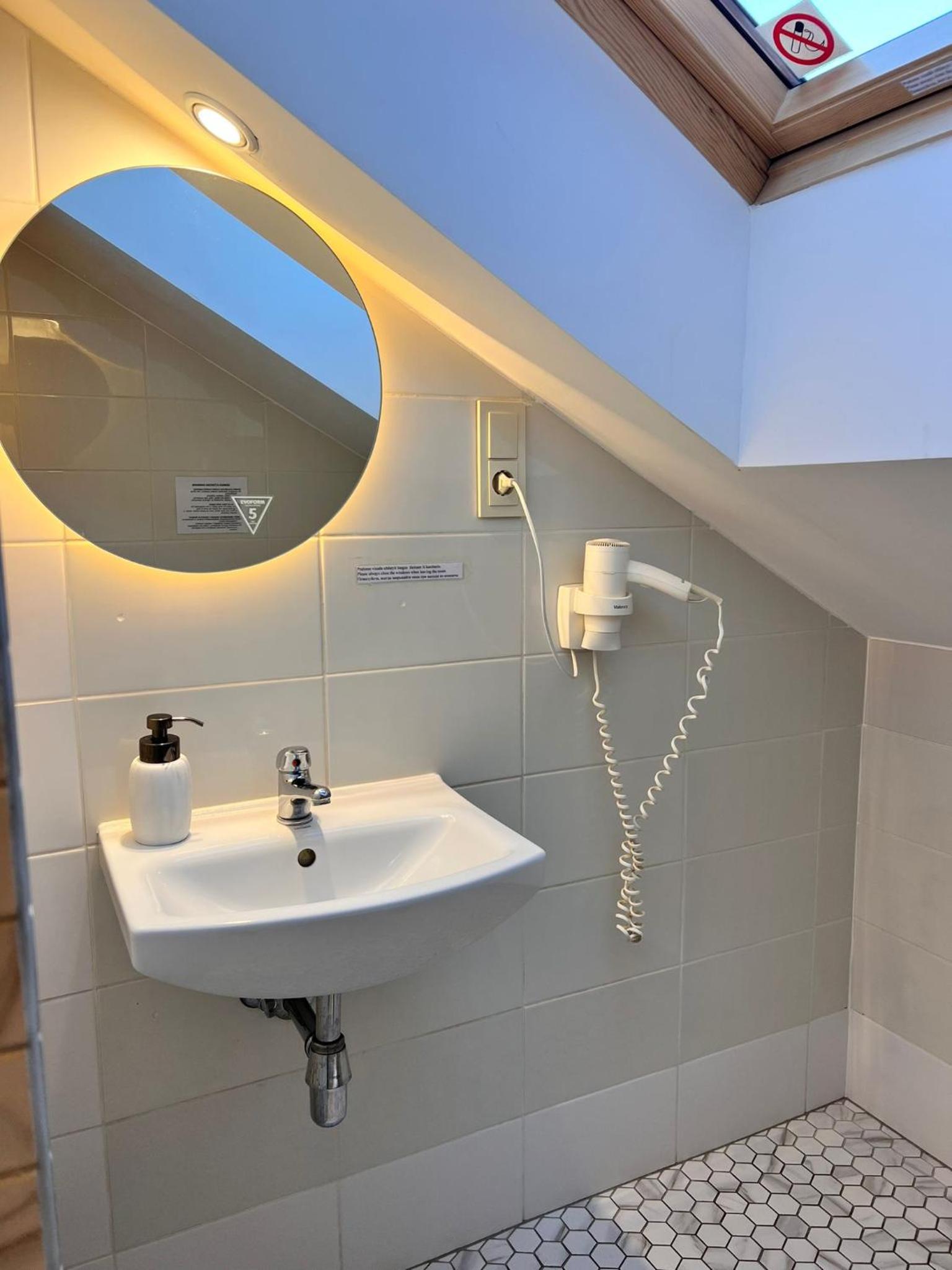 Klaipeda INN Private Parking and Kitchen view 3