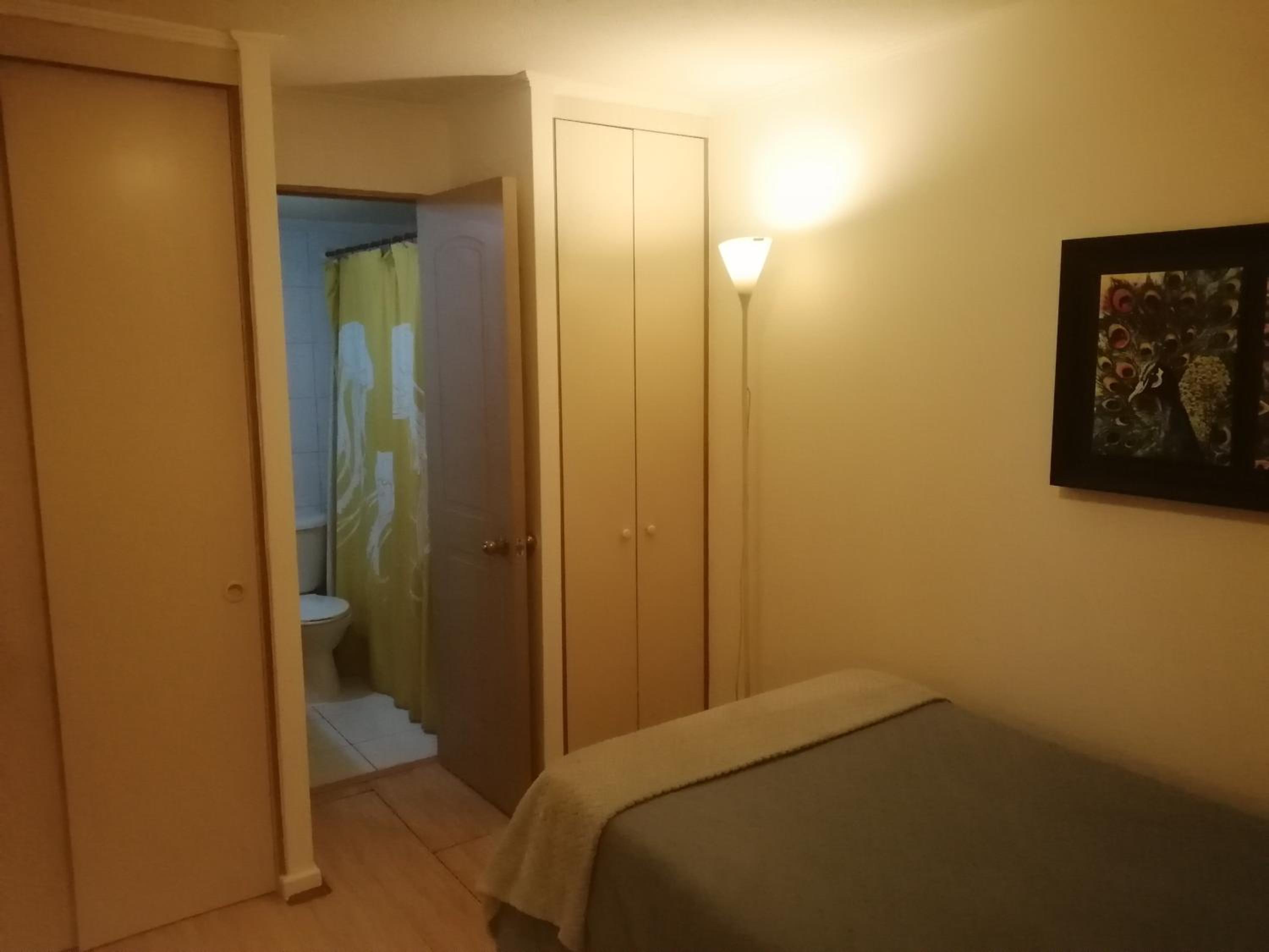 Room and bathroom in private residence