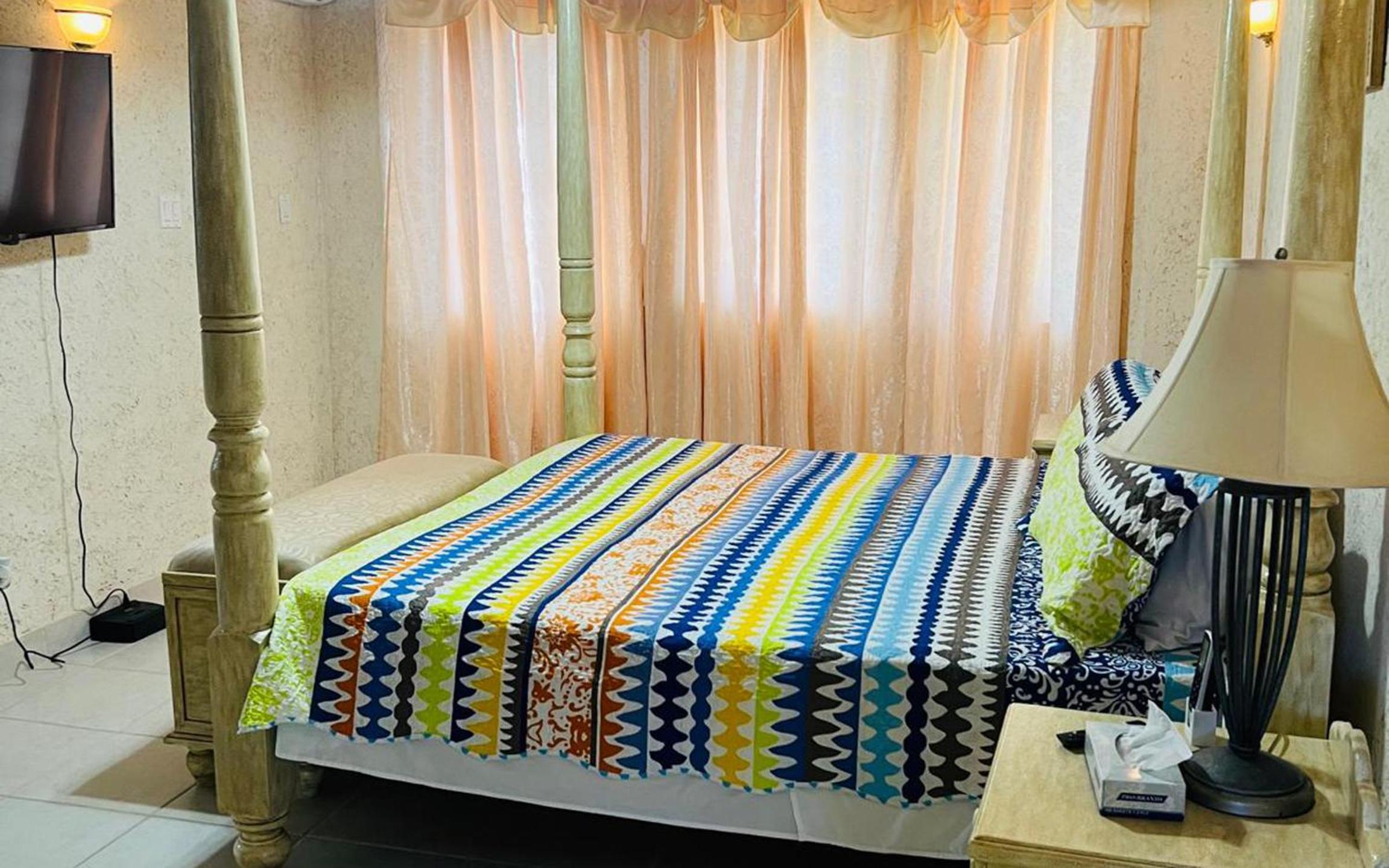 Escape to a delightful spacious family villa near Holetown