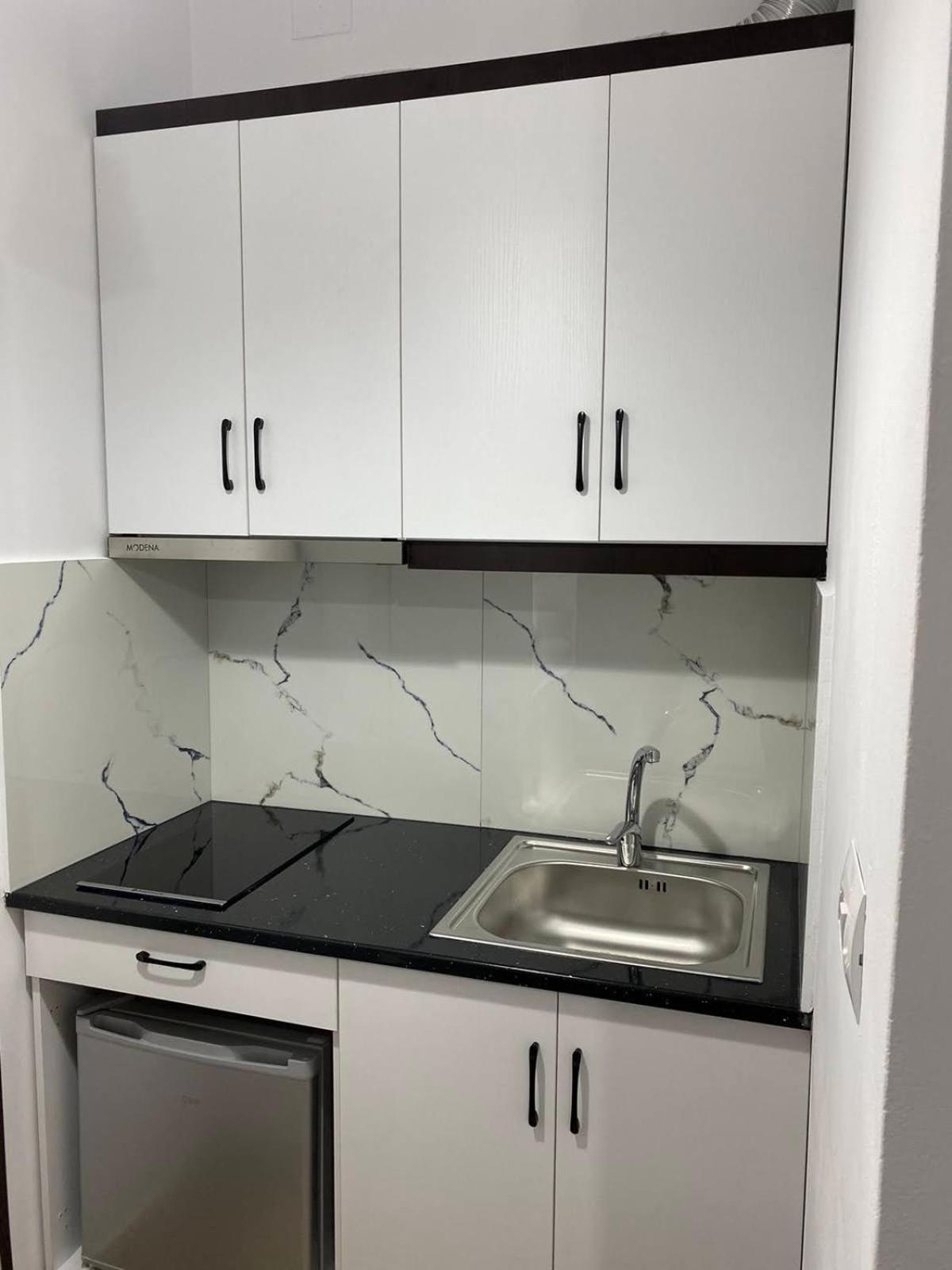 Rentrooms Geni photo 4