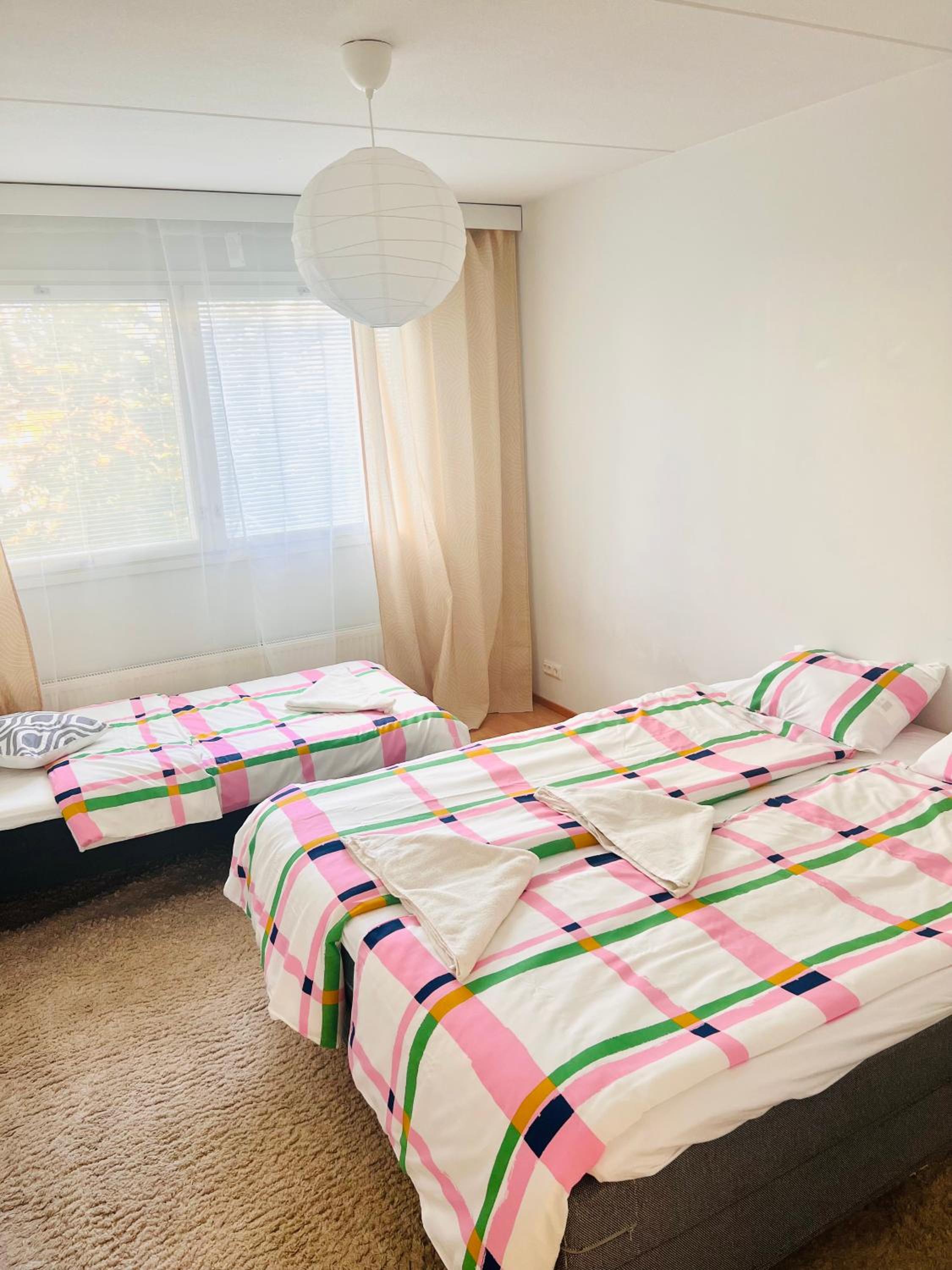 Spacious 2BR City Retreat with Private Sauna