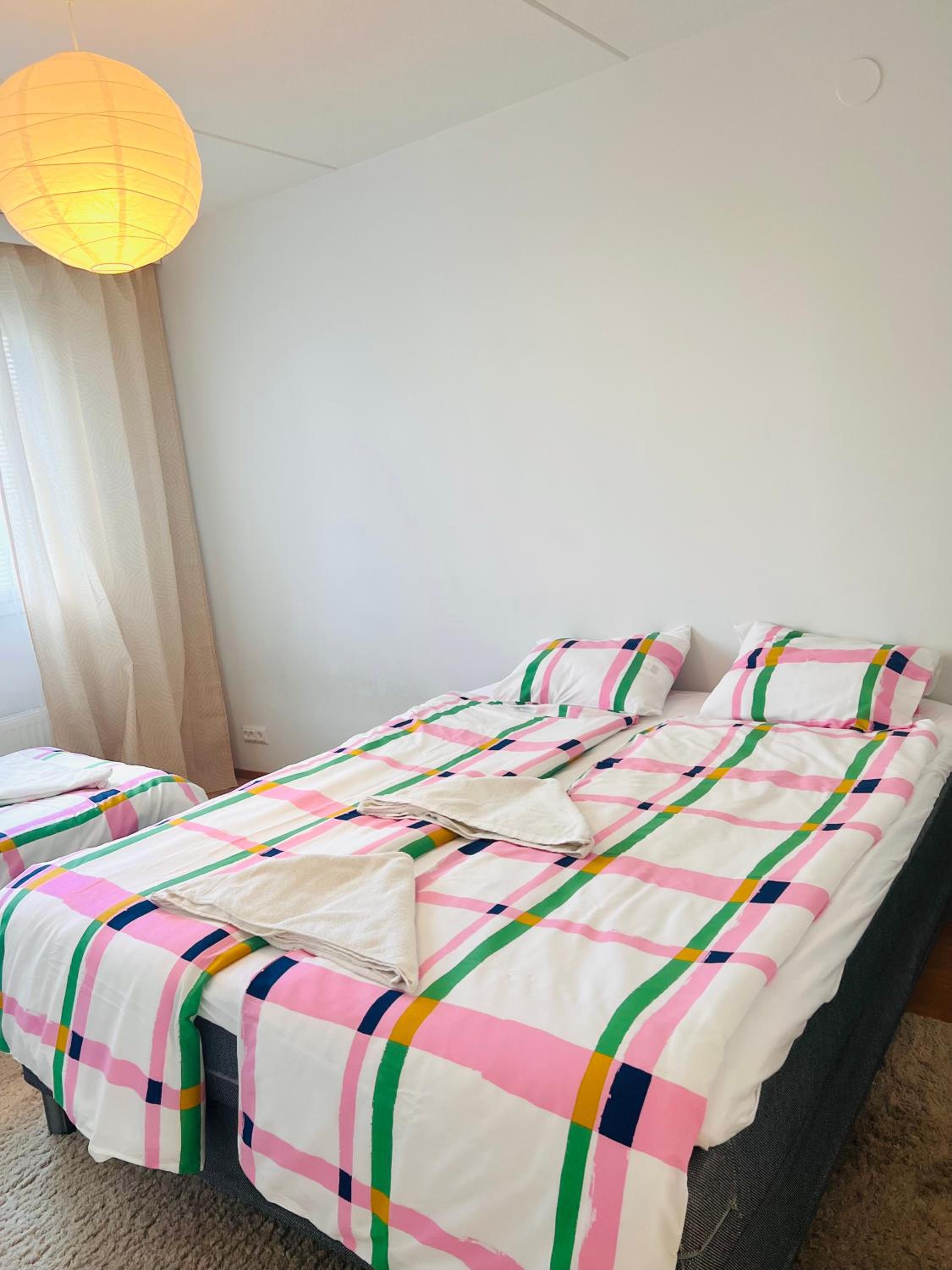 Spacious 2BR City Retreat with Private Sauna