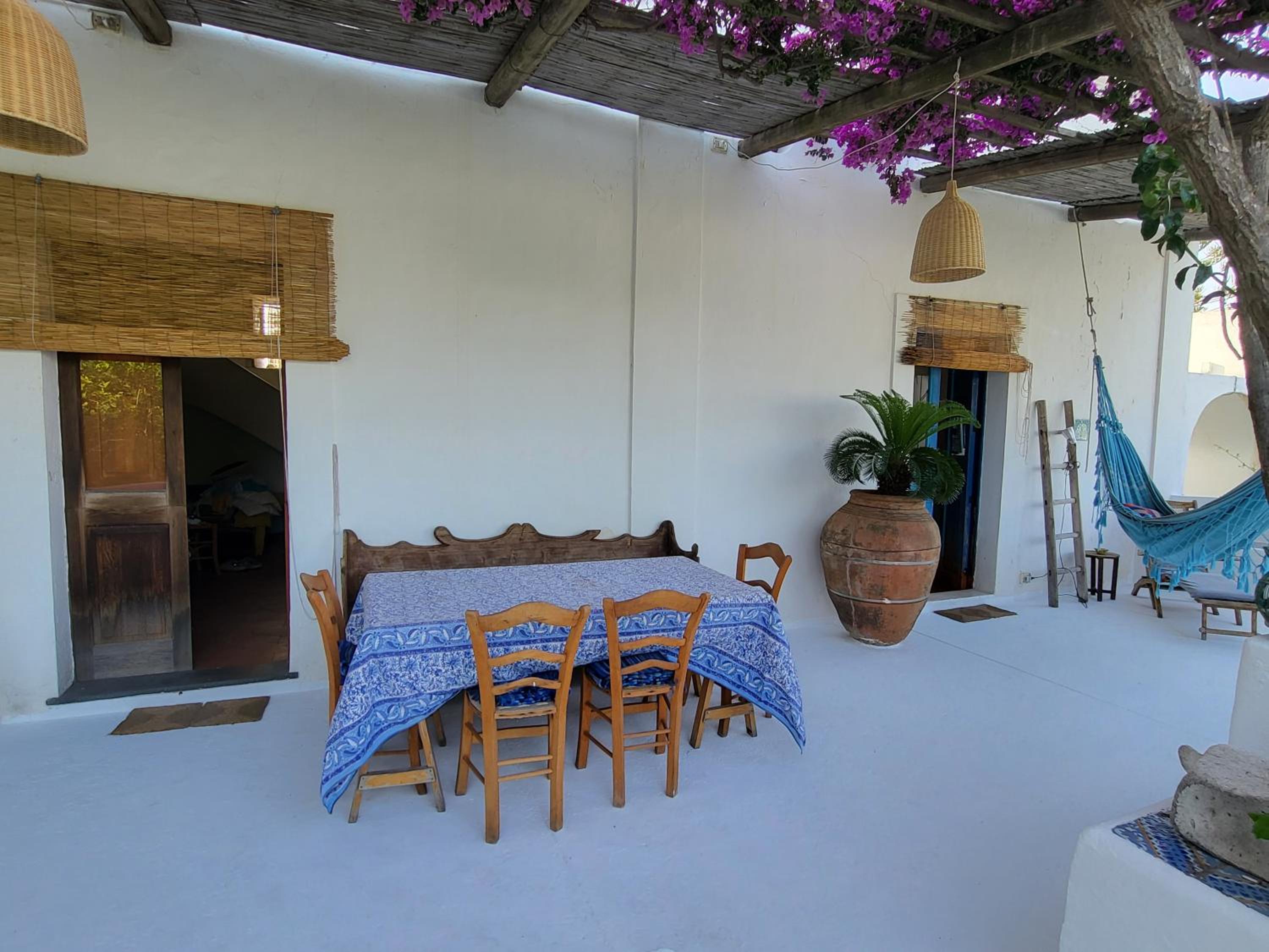 Antica casa eoliana con terrazza vista sul faro di Strombolicchio e giardino photo 2