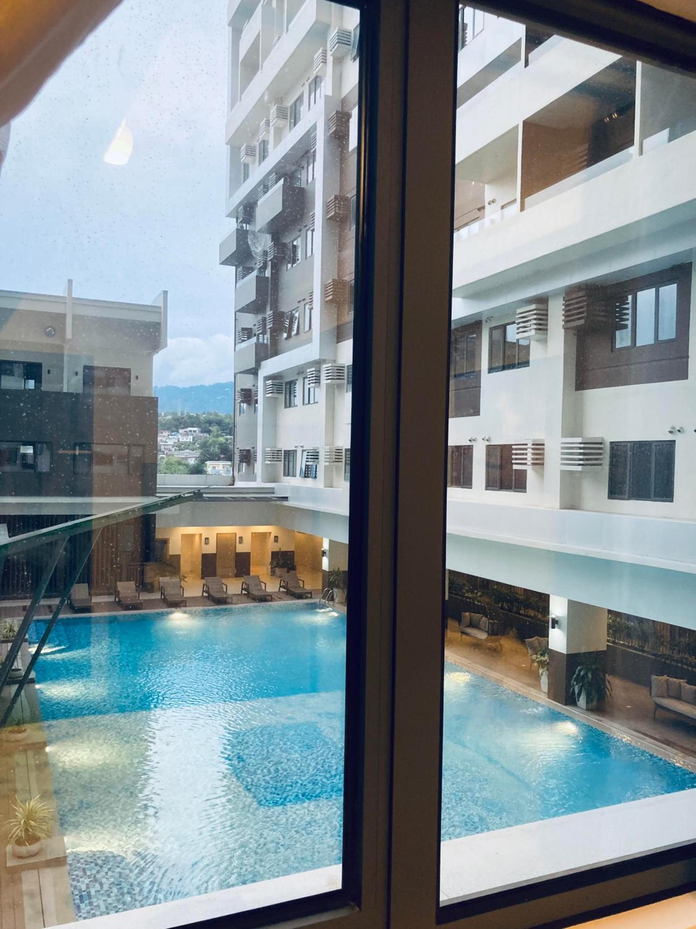 By Trixia BE Apartments, Luxury Studio Apartments, AC, Pool, Gym, near IT Park view 2