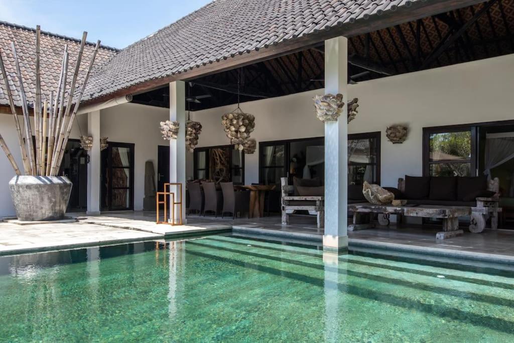 Beautiful Beach Villa Nujum with staff.