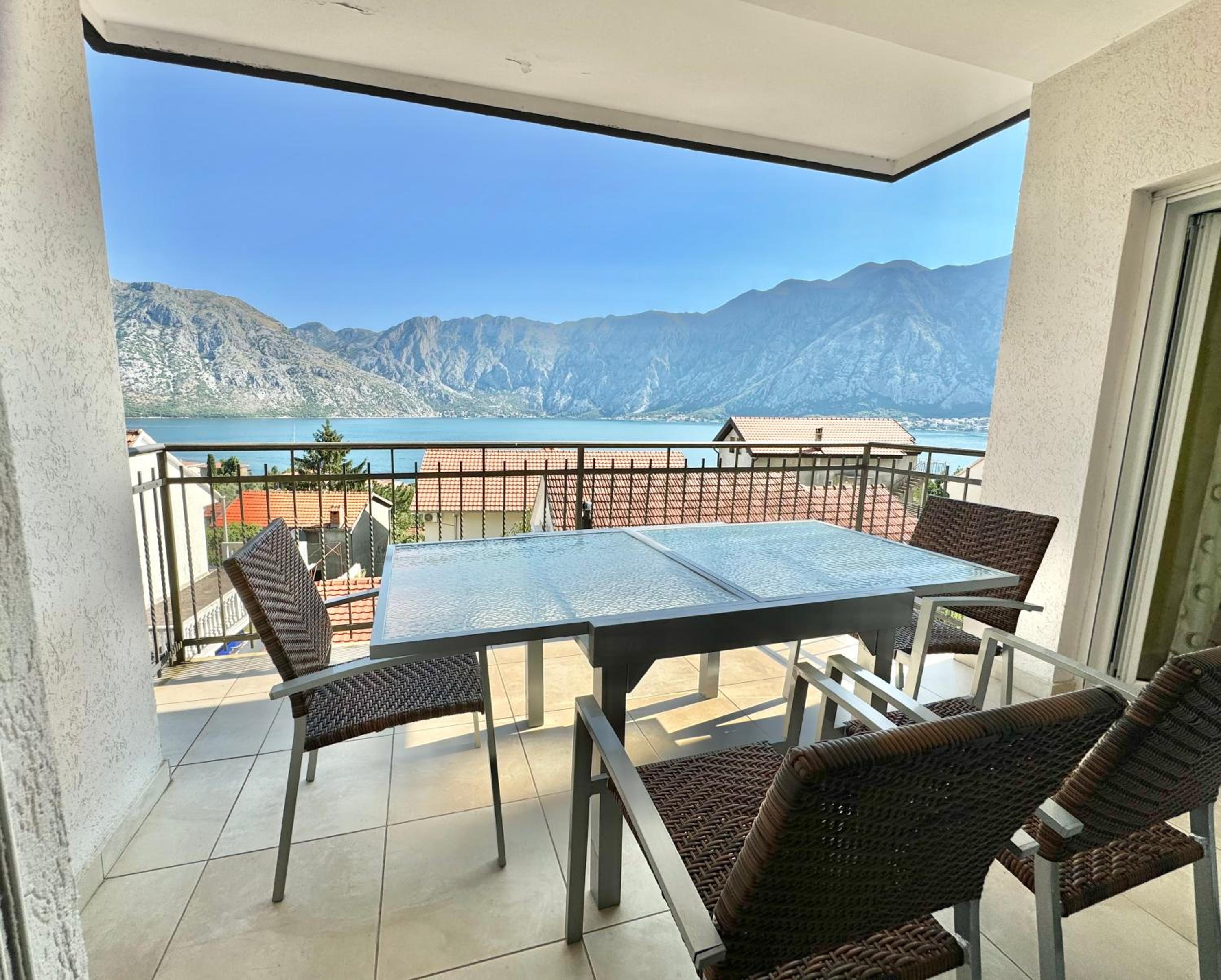 Prcanj sunny port apartments with shared pool view 2