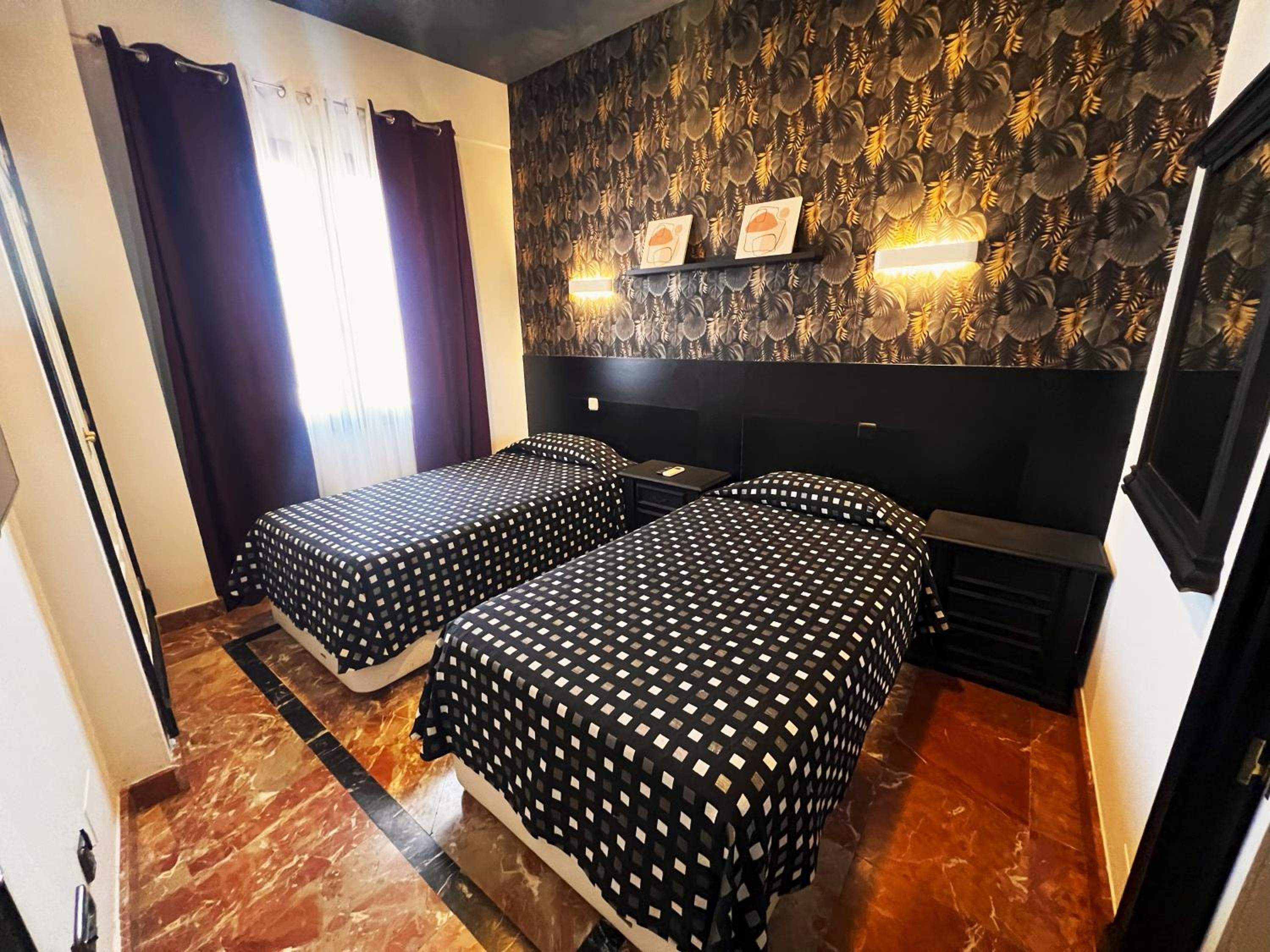 Apartamentos El Tiempo