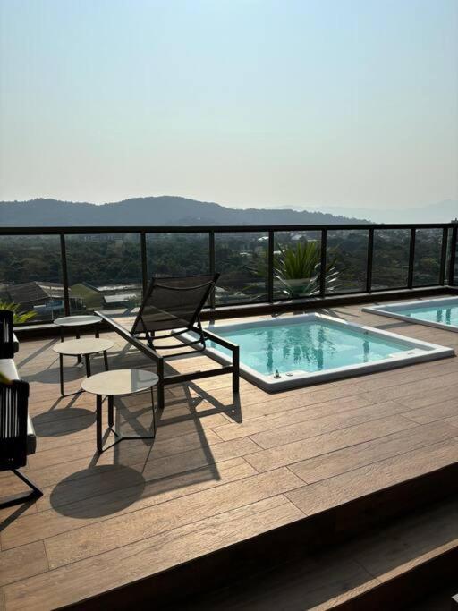 Apto Elegante com Localização Privilegiada e Rooftop incrível