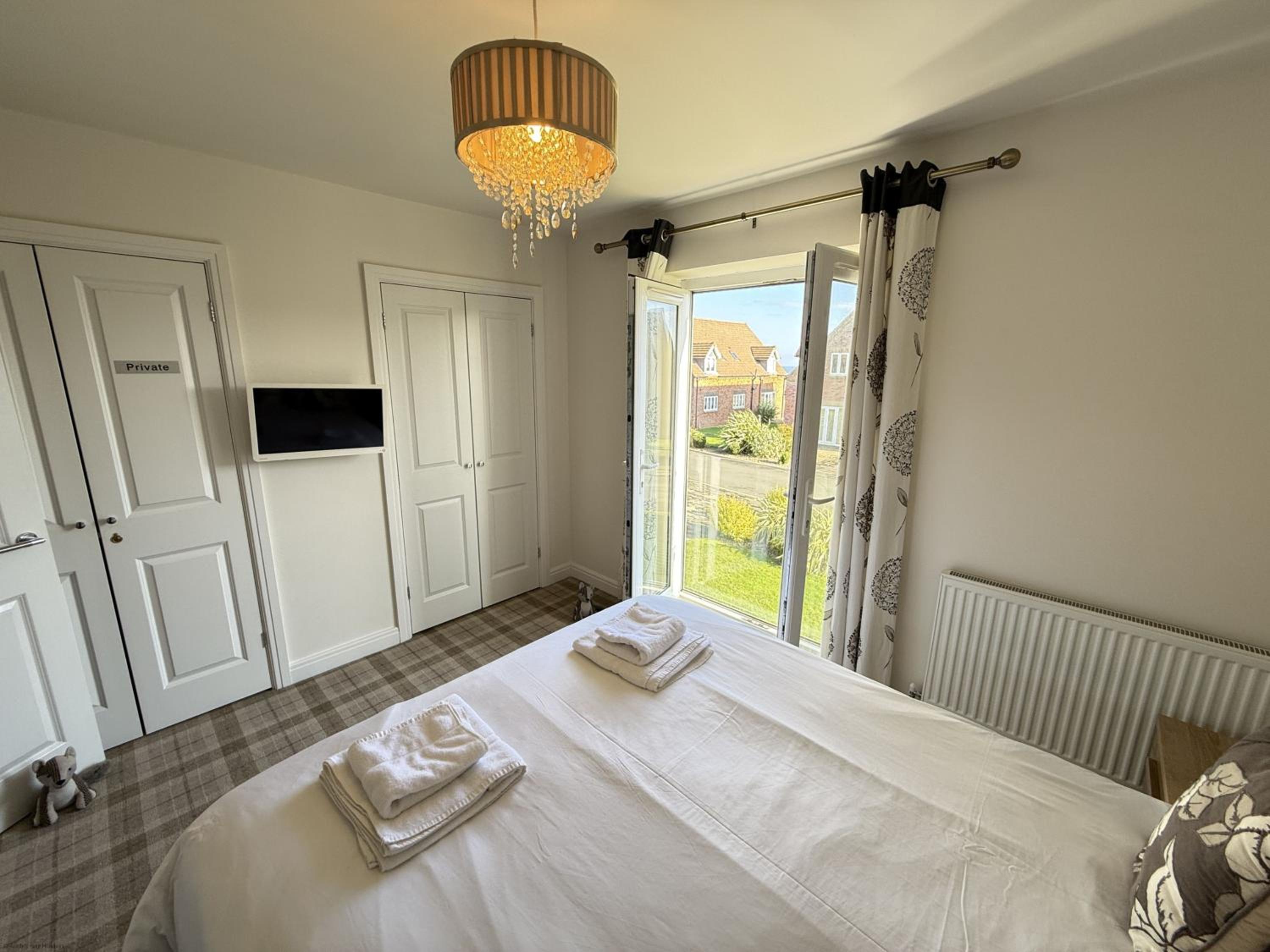Beachside Cottage - Part of the The Bay Filey Holiday Village with pool, gym and direct beach access, pub, restaurant, tennis and meadows walks