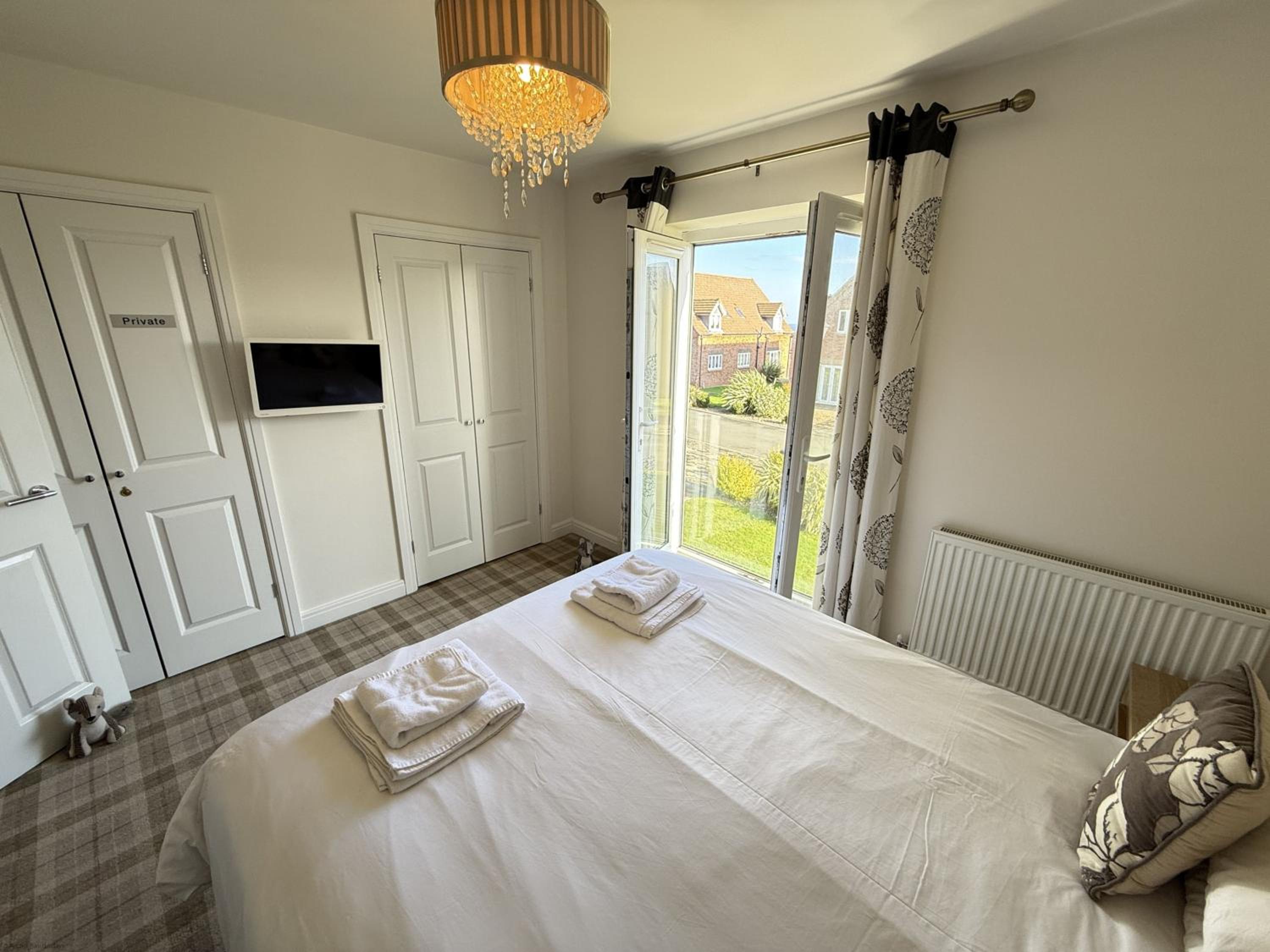 Beachside Cottage - Part of the The Bay Filey Holiday Village with pool, gym and direct beach access, pub, restaurant, tennis and meadows walks