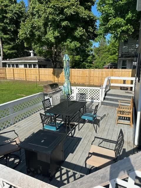 Spacious 4 BR 2BA Home with Bar and Fenced Yard view 2
