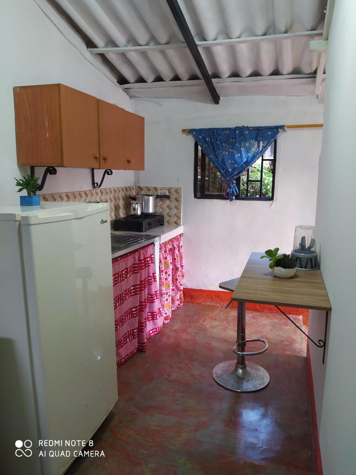 pequeña casa en finca cafetera