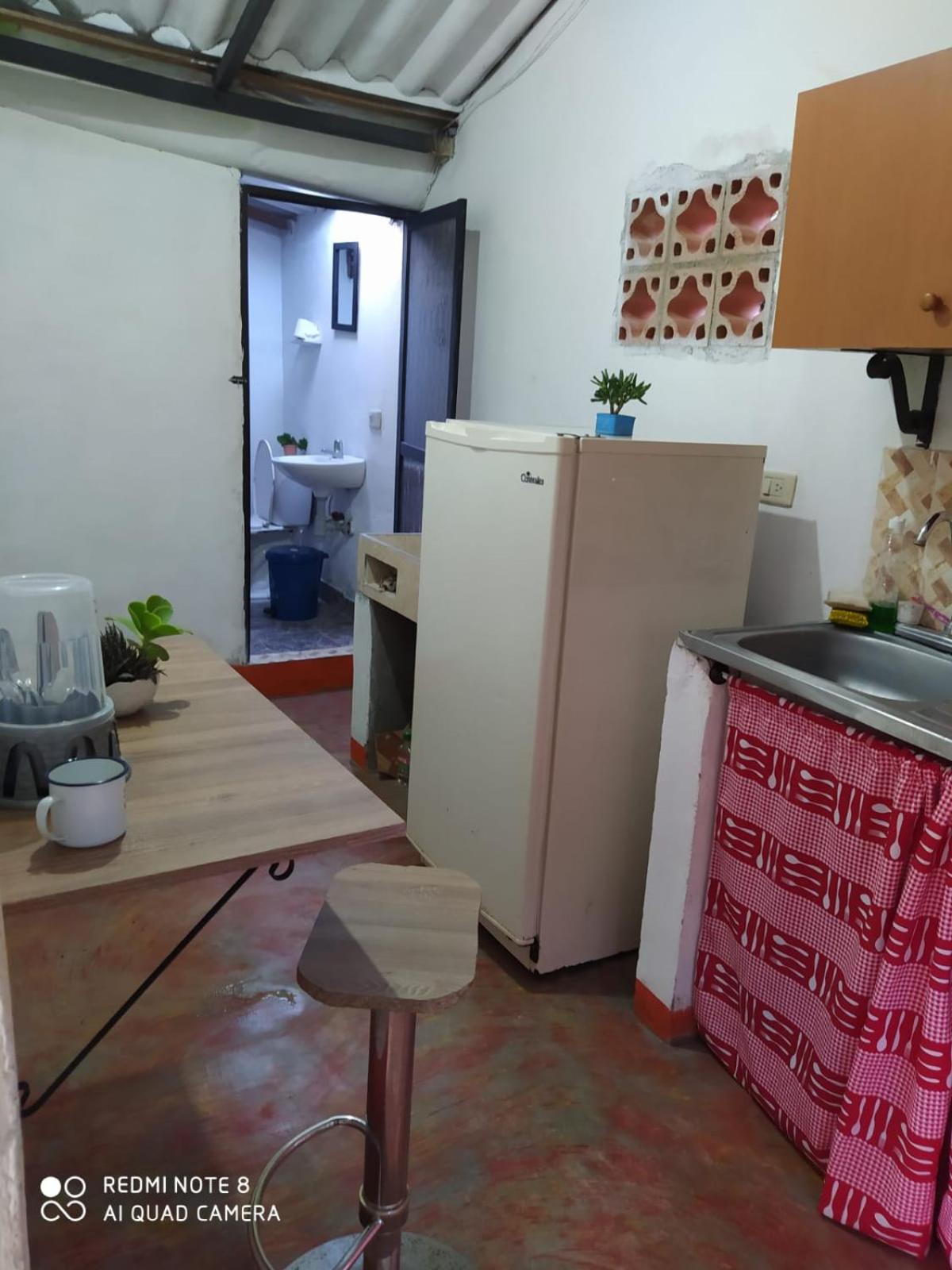 pequeña casa en finca cafetera