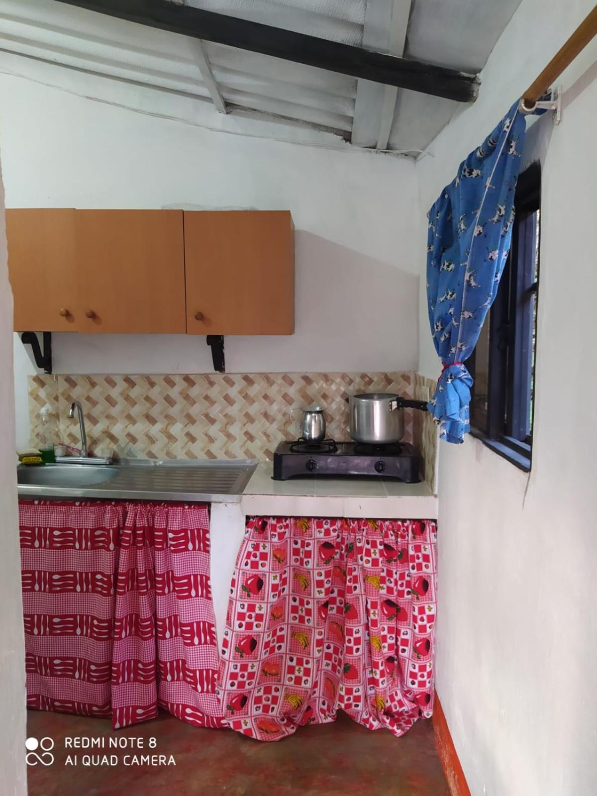pequeña casa en finca cafetera