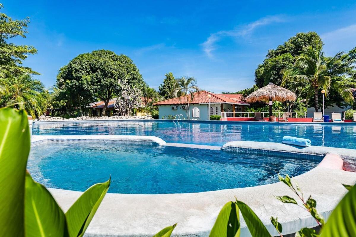 Poolside villa near beach large private patio