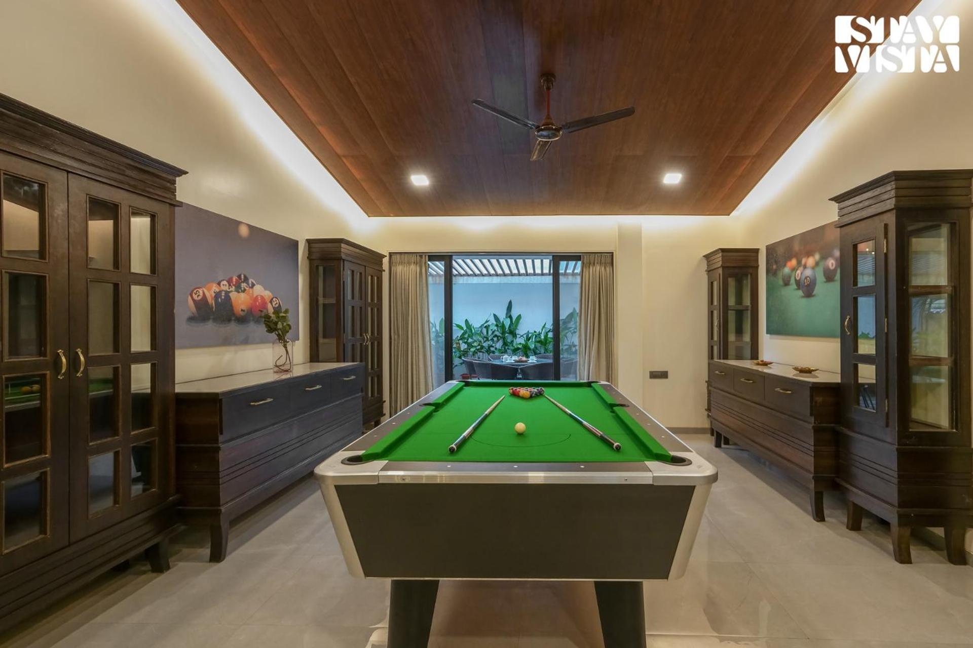 StayVista's Casa Ember - Relax with a Pool Table, Gazebo, and Inviting Swimming Pool view 5