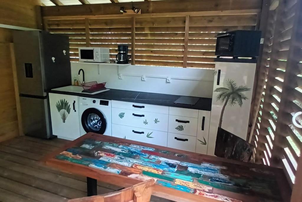 Ti' Nid Mango Cabane charmante et confortable