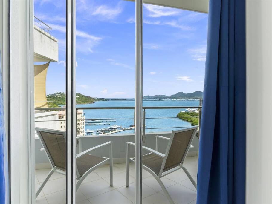 Luxury Lagoon-View Condo Steps to Beach