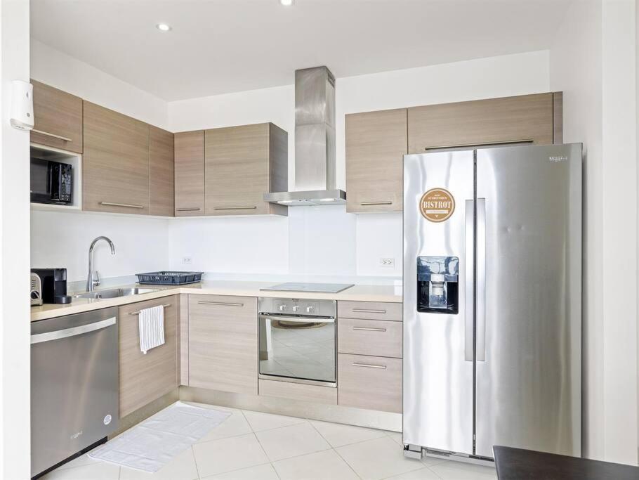 Luxury Lagoon-View Condo Steps to Beach