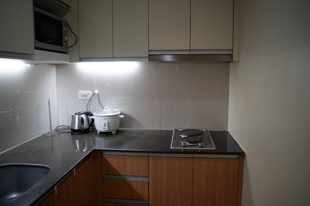 Cozy Condo with beach access Lapu-Lapu Mactan