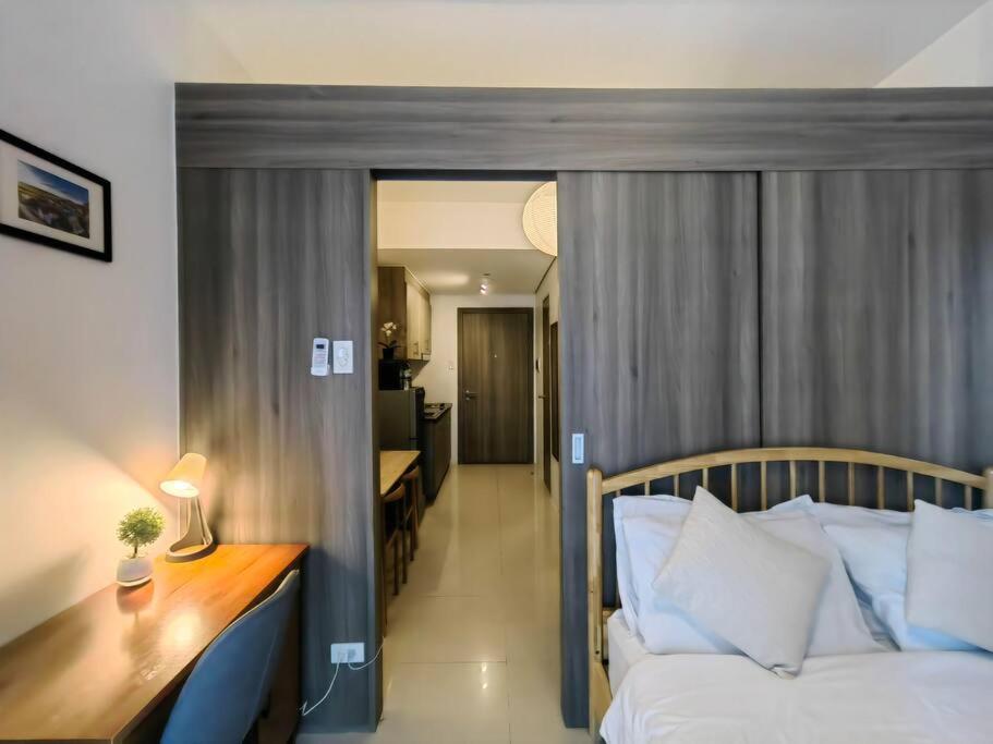 1BR Condotel with Balcony at FAME Residences #FM55 view 2