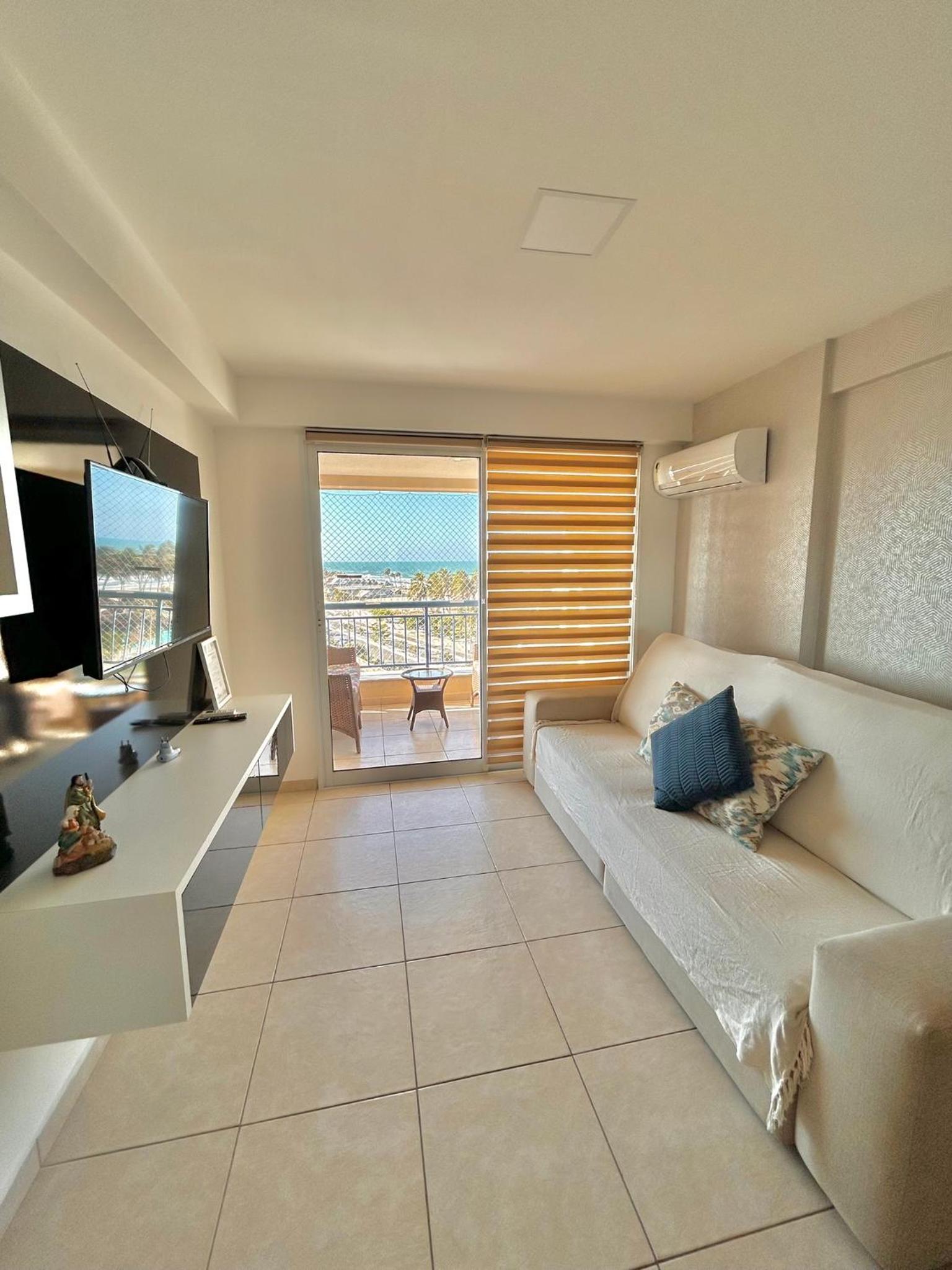 Beachfront Vacation - Beach Village Residence by Casamarinn