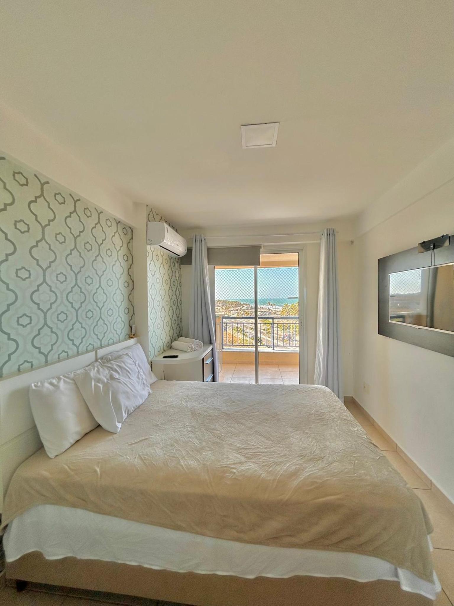 Beachfront Vacation - Beach Village Residence by Casamarinn
