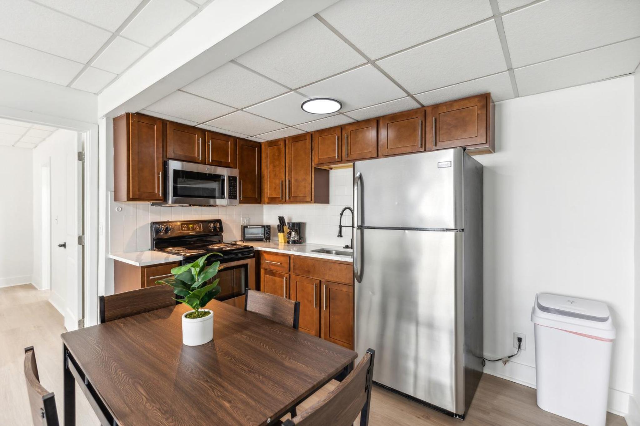 East 116 I Corporate 1Bd Suite in Rochester I Gym view 4
