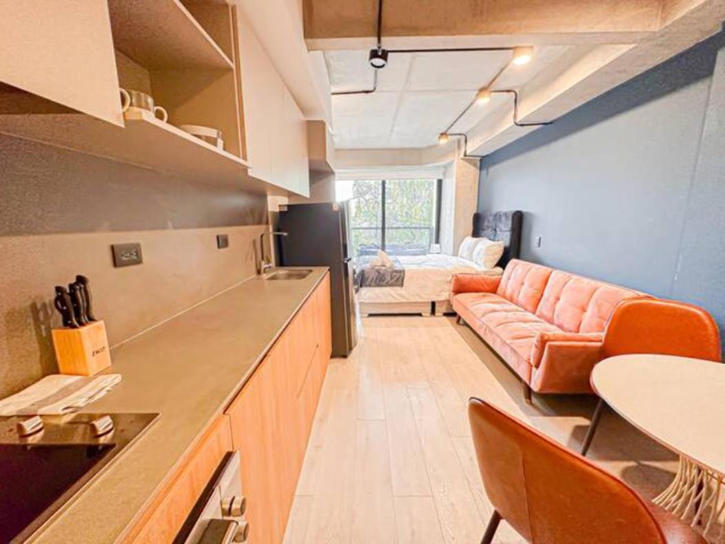 Skyline Suites - Elegant Living with Coworking & Scenic Views