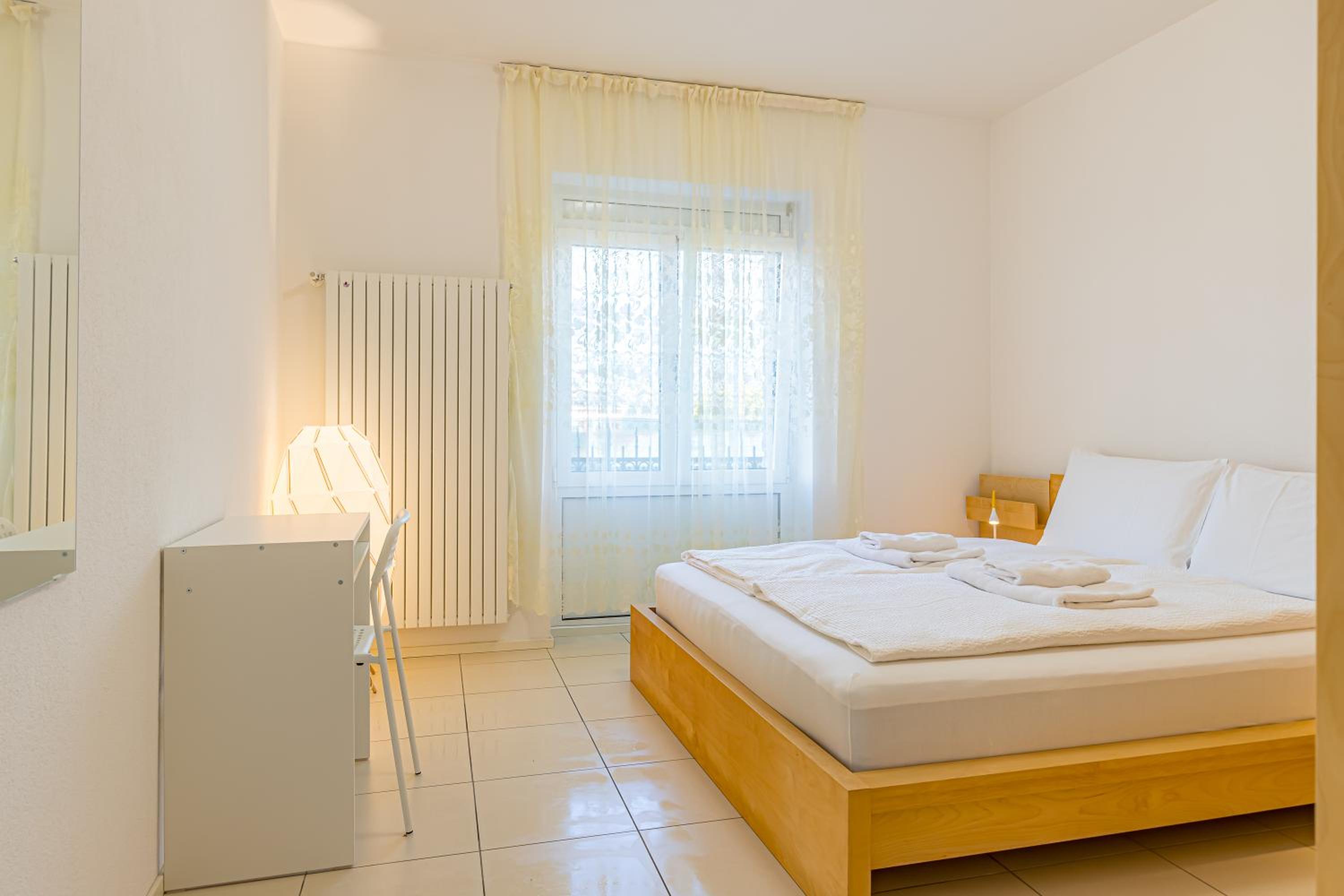 Imperial of Lugano 2 with a lake view and garden behind the station and 10 min from the lake of Lugano