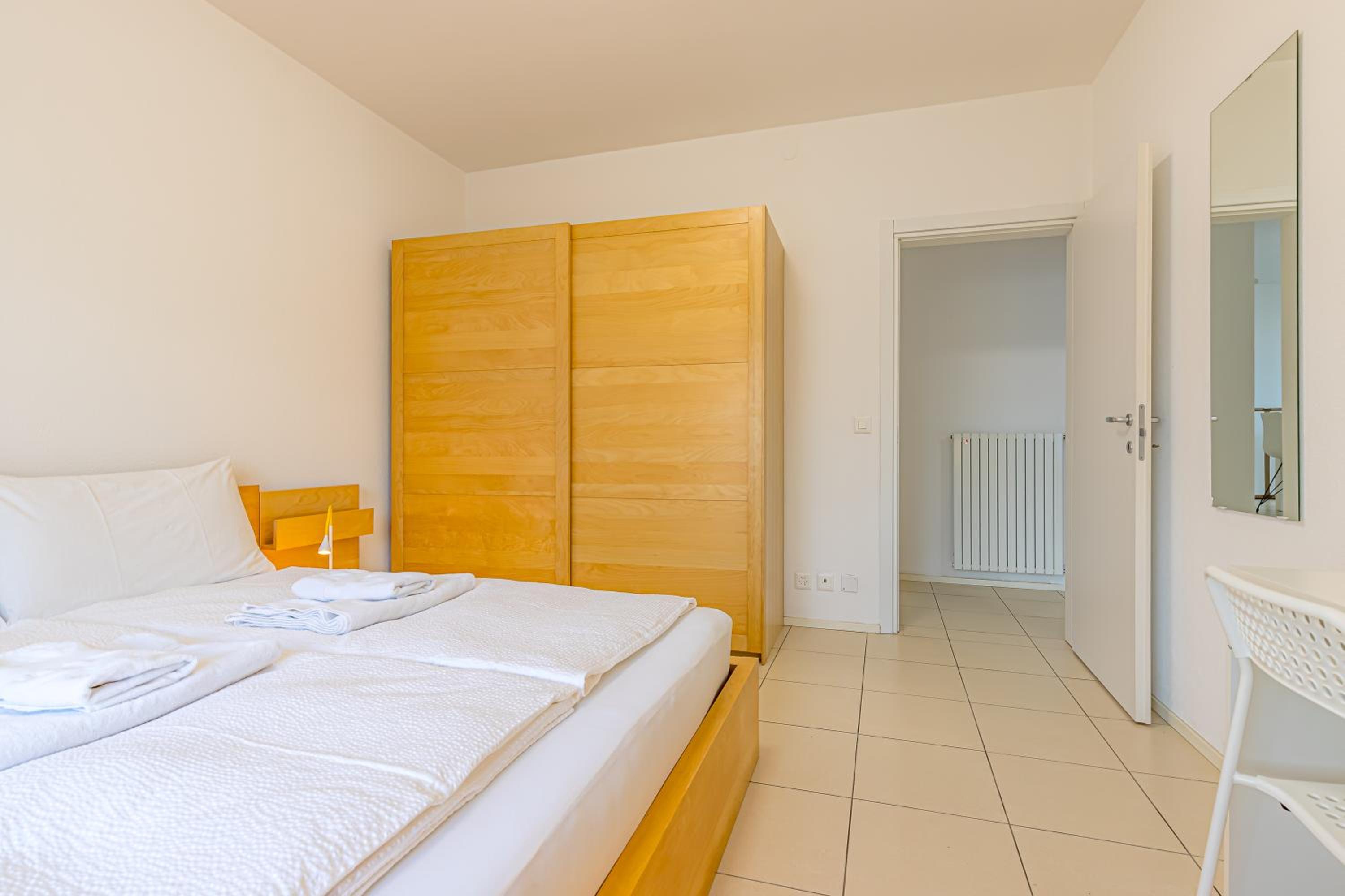 Imperial of Lugano 2 with a lake view and garden behind the station and 10 min from the lake of Lugano