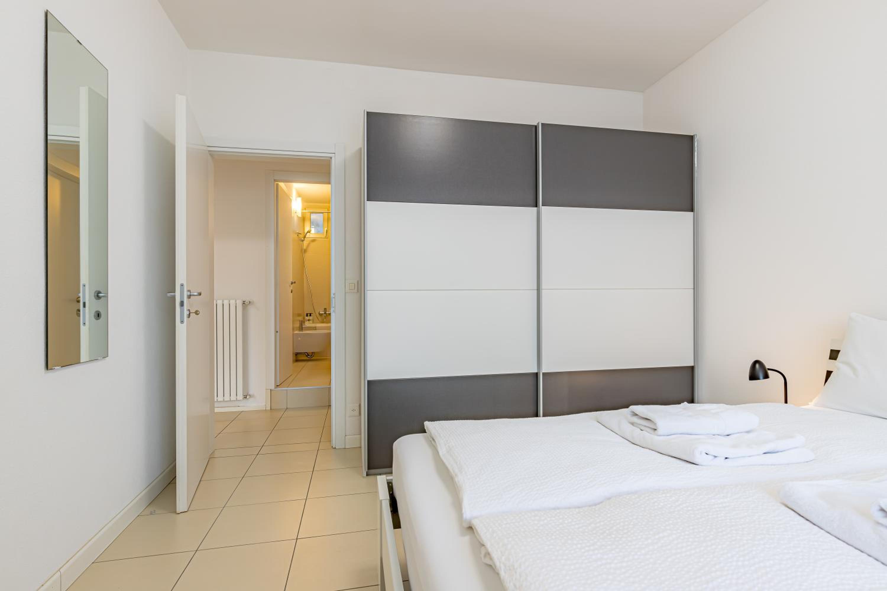 Imperial of Lugano 2 with a lake view and garden behind the station and 10 min from the lake of Lugano