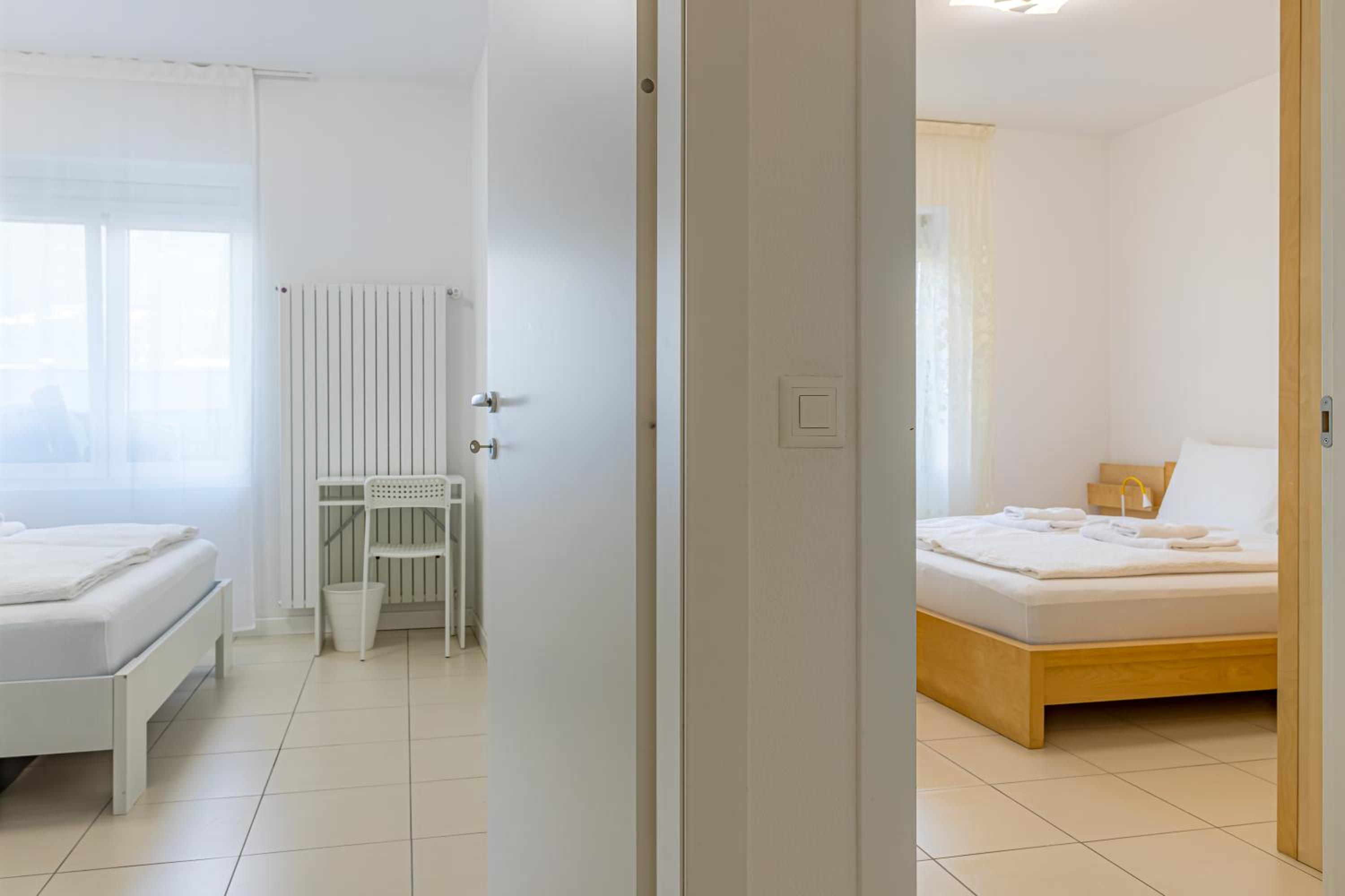 Imperial of Lugano 2 with a lake view and garden behind the station and 10 min from the lake of Lugano
