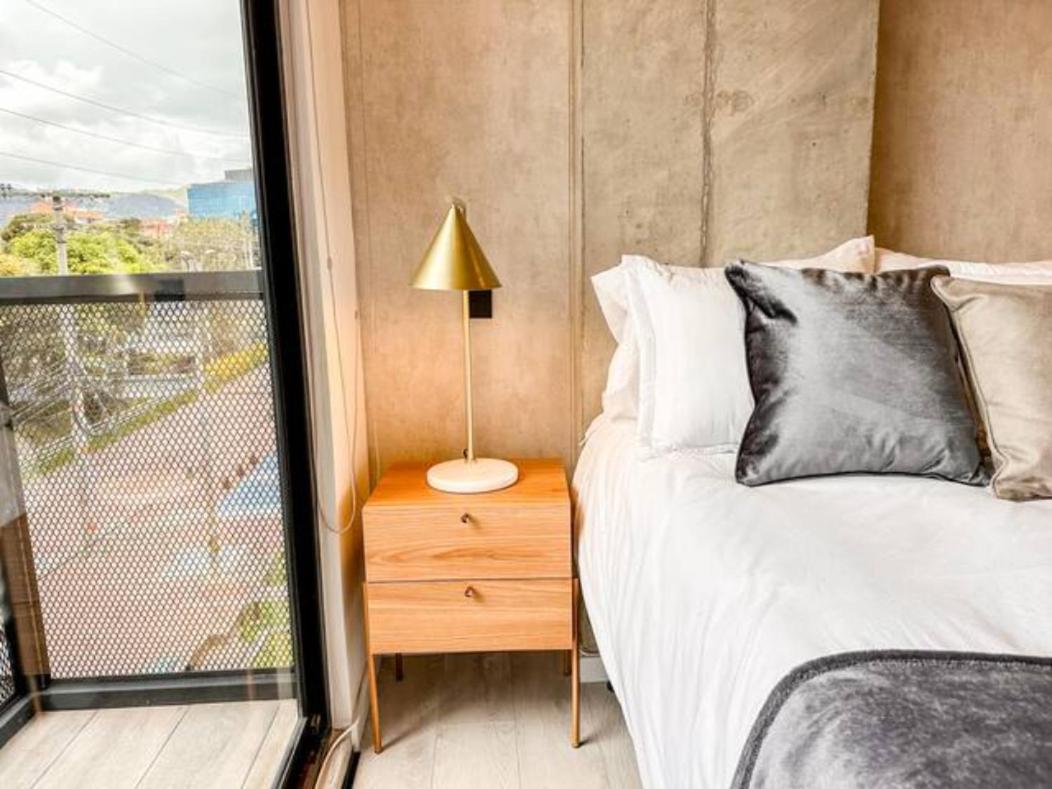 Skyline Suites - Elegant Living with Coworking & Scenic Views