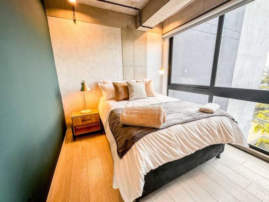 Skyline Suites - Elegant Living with Coworking & Scenic Views