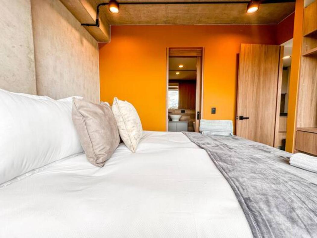 Skyline Suites - Elegant Living with Coworking & Scenic Views