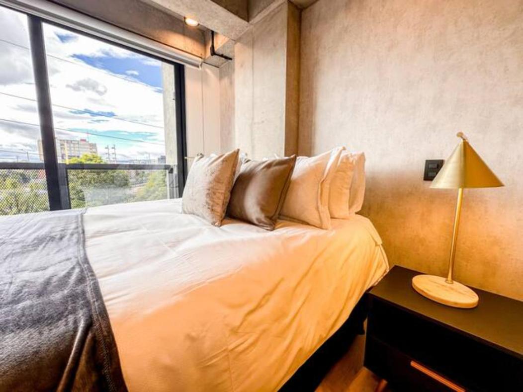 Skyline Suites - Elegant Living with Coworking & Scenic Views