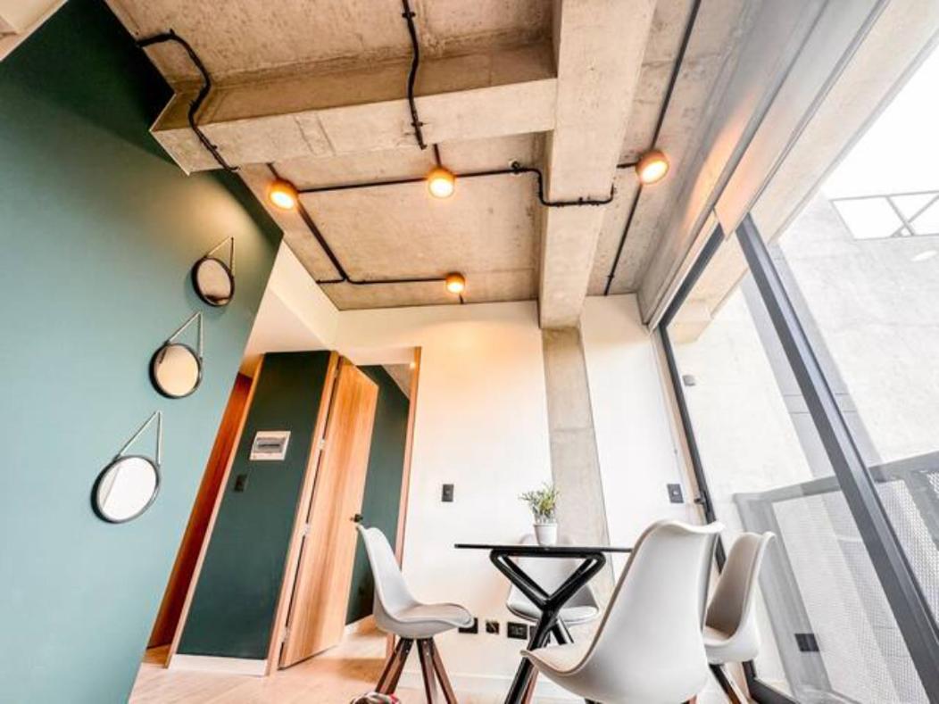 Skyline Suites - Elegant Living with Coworking & Scenic Views