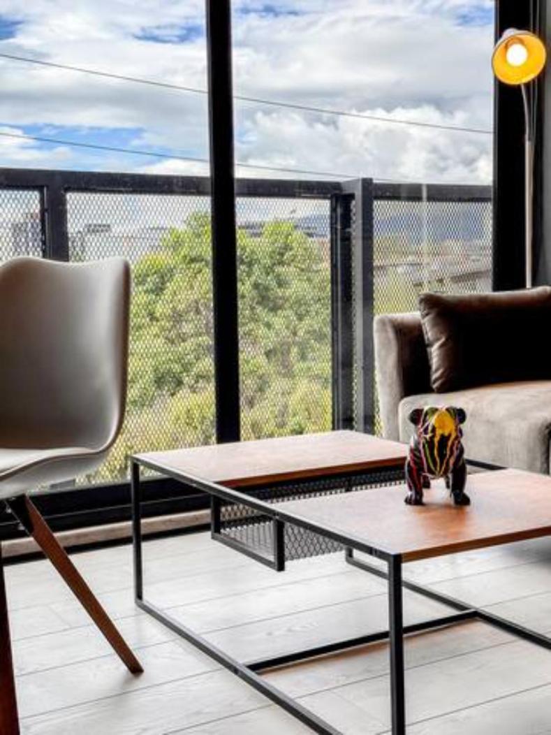 Skyline Suites - Elegant Living with Coworking & Scenic Views
