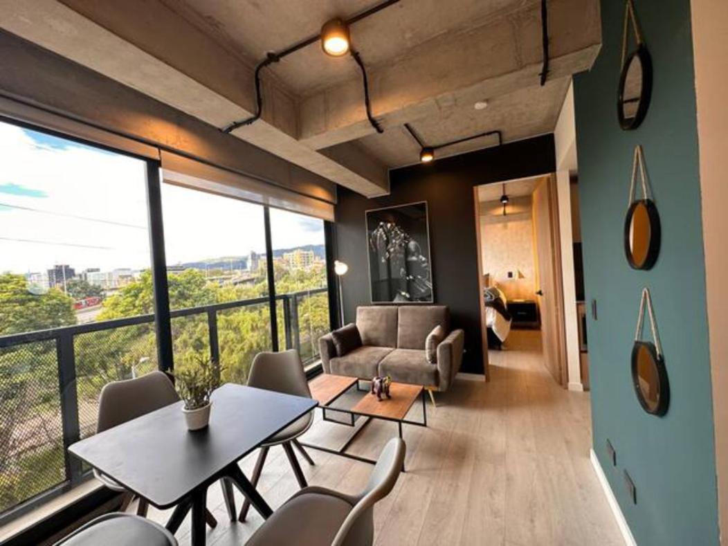 Skyline Suites - Elegant Living with Coworking & Scenic Views