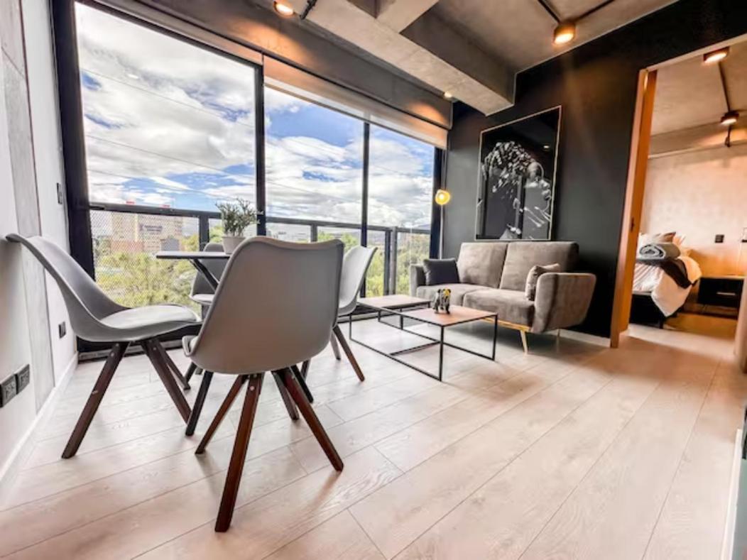Skyline Suites - Elegant Living with Coworking & Scenic Views