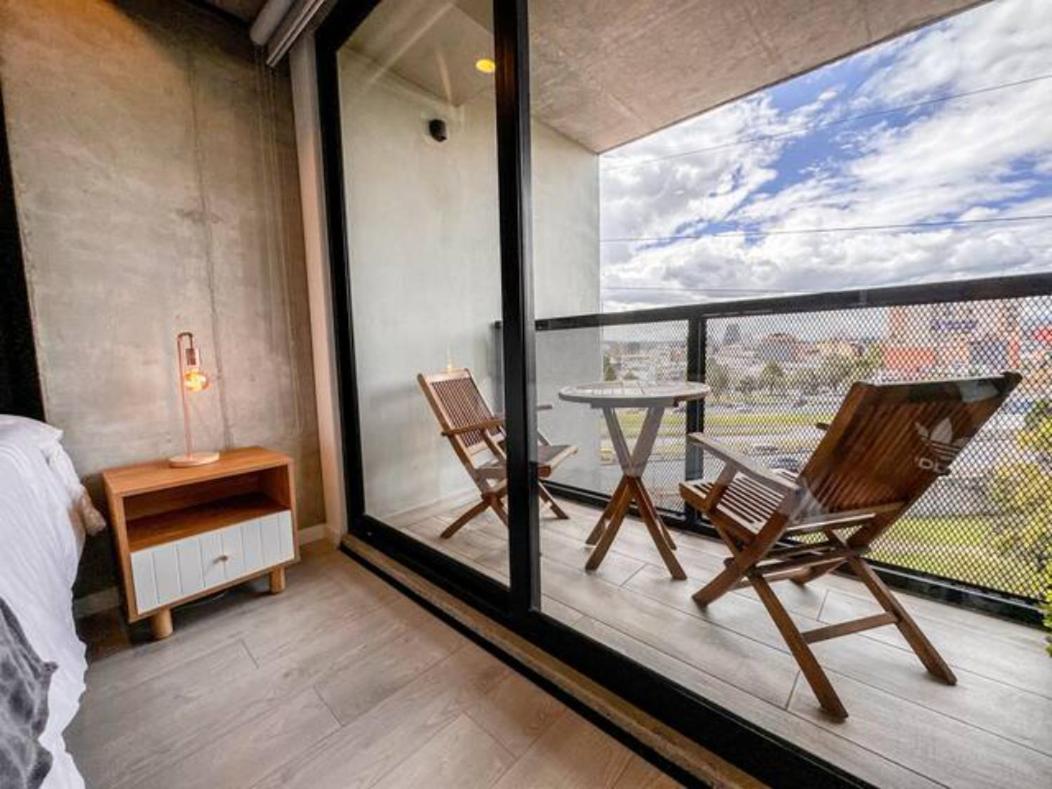 Skyline Suites - Elegant Living with Coworking & Scenic Views